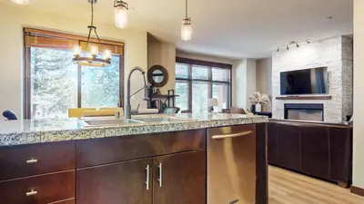 a kitchen with a sink and a counter top at Solstice 10 Apartment in Mammoth Lakes