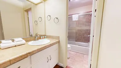 a bathroom with a sink and a shower at Summit 49 Apartment in Mammoth Lakes