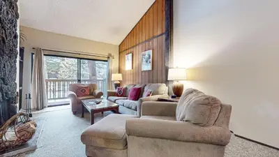 a living room with two couches and a couch at Mammoth Reservations in Mammoth Lakes