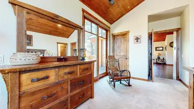 a kitchen with a wooden dresser in a room at Gray Stone 2088 Holiday home in Mammoth Lakes