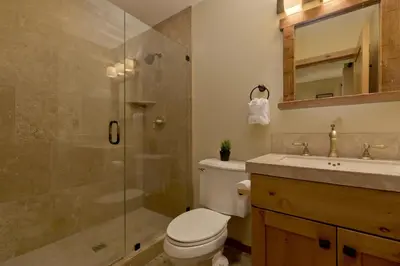 a bathroom with a toilet and a shower and a sink at Stonegate 5 Holiday home in Mammoth Lakes
