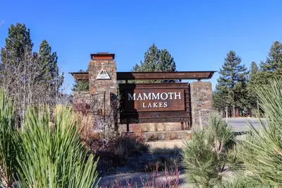a sign for a manuth leaves sign on a building at Stonegate 5 Holiday home in Mammoth Lakes