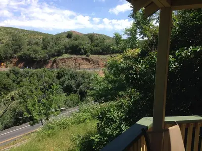 a view of a road from the porch of a house at Priest Station Cafe & Cabins in Groveland