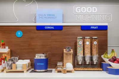 a grocery store with food items on a shelf at Holiday Inn Express Elk Grove West I-5 by IHG in Elk Grove