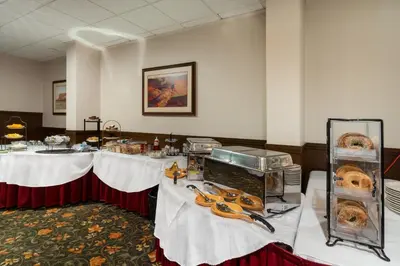 a room with two tables with donuts on them at Ramada by Wyndham Reno Hotel & Casino in Reno