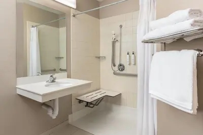 a bathroom with a sink and a shower at SpringHill Suites by Marriott Sacramento Roseville in Roseville