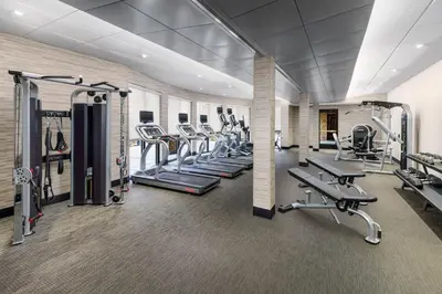 a gym with several treadmills and cardio equipment at Courtyard by Marriott Sacramento Folsom in Folsom