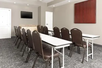 a conference room with a table and chairs at TownePlace Suites by Marriott Sacramento Roseville in Roseville