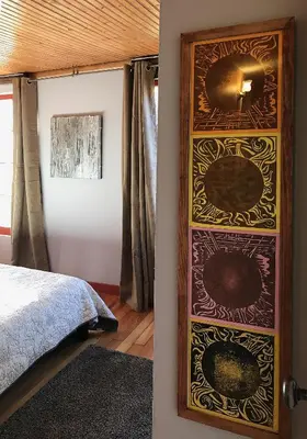 a wooden dresser in a bedroom with a bed at Merrynook in Pinehurst