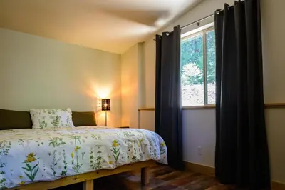 a bedroom with a bed and a window at Alpenglow 2 in Yosemite West