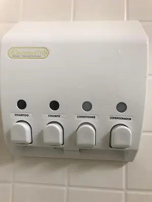 a white lightswitch on a wall in a bathroom at Mystic Views in Yosemite West