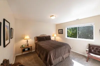 a bedroom with a bed and a window at Yosemite Park Place in Yosemite West
