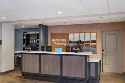 a lobby with a welcome bar in a pharmacy at Hampton Inn by Hilton Turlock in Turlock