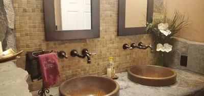 a bathroom with a sink and a mirror at Alta Peak Vista in Three Rivers