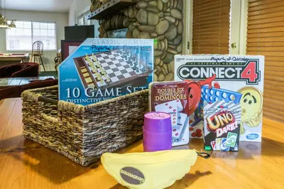 a basket of games and other items on a table at Yosemite Sierra Blossom in Yosemite West