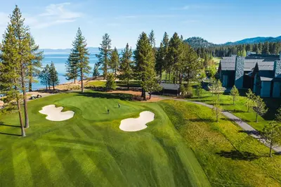 an overhead view of a golf course with two putting greens at Edgewood Tahoe Resort in Stateline