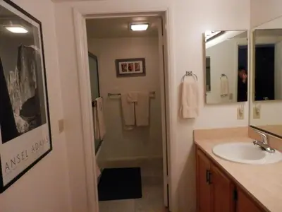 a bathroom with a sink and a shower and a mirror at Rr-interlaken 29 in June Lake