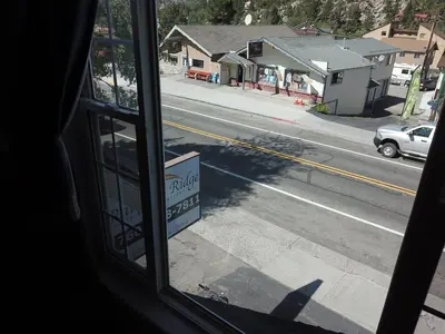 a view of a street from a bus window at Rainbow Ridge B - 1BR/1BA in June Lake