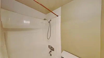a shower in a bathroom with a toilet at Lakeview 826 Condo #108 Condo in Mammoth Lakes