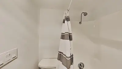 a bathroom with a toilet and a towel at Great 3 Bedroom Condo with Washer and Dryer! in Mammoth Lakes