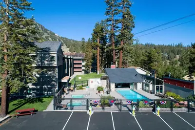 an aerial view of a house with a parking lot at Great 3 Bedroom Condo with Washer and Dryer! in Mammoth Lakes
