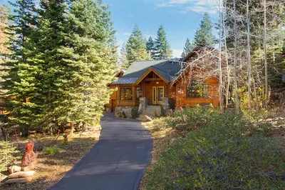 a wooden house with a pathway leading to it at Northstar - Sierra Gold Home in Kingswood Estates