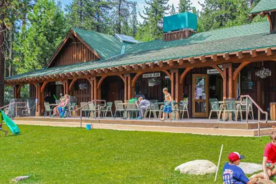 a group of people sitting in front of a building at Hillside View Home in Truckee