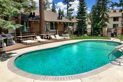 a swimming pool in front of a house at Discovery 4 119 in Mammoth Lakes