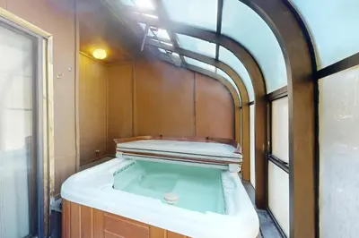 a bath tub in the middle of a room at Forest Creek 22 in Mammoth Lakes