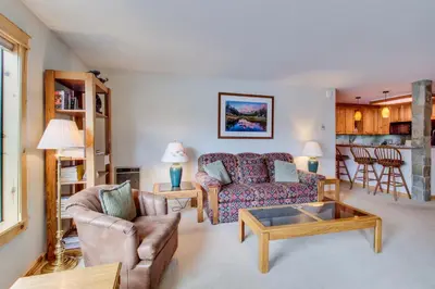 a living room with a couch and a table at The Summit 67 in Old Mammoth