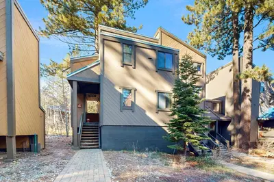 a house with a staircase leading to the front door at Great Northstar Condo in Kingswood Estates