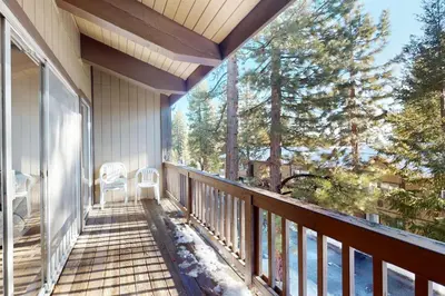 a balcony of a house with a view of trees at Dollar Hill 2 Dreamcatcher in Dollar Point