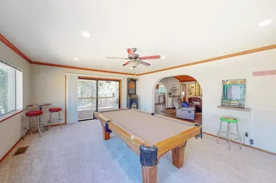 a living room with a pool table in it at Owl's Lookout (05/061) in Groveland