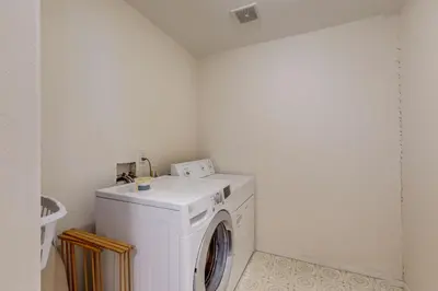 a white washer and dryer in a room at Jade House in Truckee