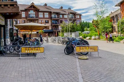 a bunch of bikes parked on a street at Gold Bend 5034 in Truckee