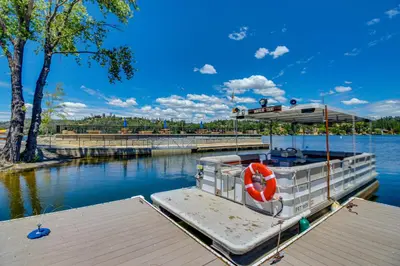 a boat is docked at a dock in the water at Forest Treasure (01/497) in Groveland