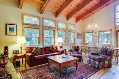 a living room with couches and a table at 1225 Gold Bend in Truckee