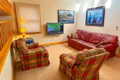 a living room with a couch and two chairs at 1225 Gold Bend in Truckee
