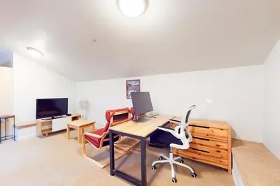 an office with a desk with a computer and two chairs at Squaw Valley Ski Flat in Olympic Valley
