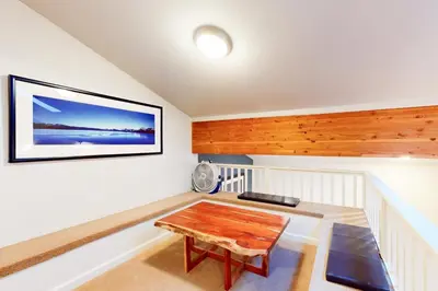 a room with a table and a picture on the wall at Squaw Valley Ski Flat in Olympic Valley