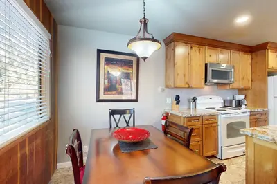 a kitchen with a table with a bowl on top of it at Nordic Retreat in Kings Beach