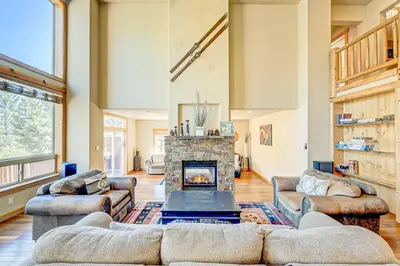 a living room with couches and a fireplace at Stockholm Luxury Retreat in Truckee