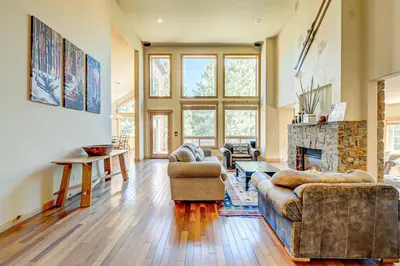a living room with two couches and a fireplace at Stockholm Luxury Retreat in Truckee
