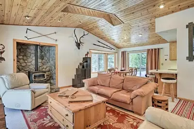 a living room with a couch and a table at Kingswood Estate Cabin Retreat in Kings Beach