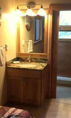 a bathroom with a sink and a mirror at 114 Premium Condo in Mammoth Lakes