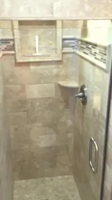 a shower with a glass door in a bathroom at 114 Premium Condo in Mammoth Lakes