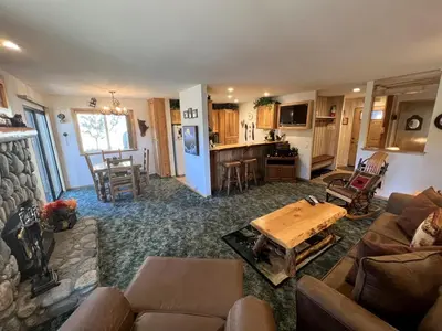 a living room with a couch and a table at 141 Premium Condo in Mammoth Lakes