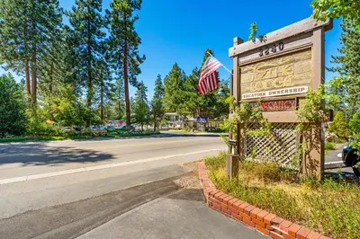 a sign for a cafe on a street at The Lodge at Lake Tahoe in South Lake Tahoe
