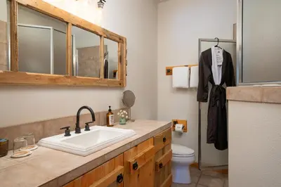 a bathroom with a sink and a toilet at Black Bear Lodge in South Lake Tahoe