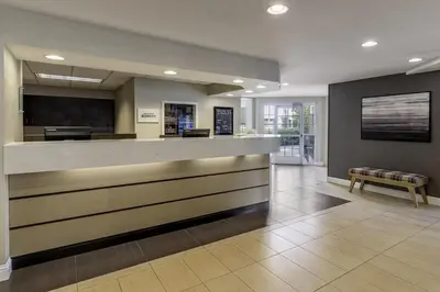 a lobby of a hospital with a reception counter at Residence Inn Sacramento Rancho Cordova in Rancho Cordova